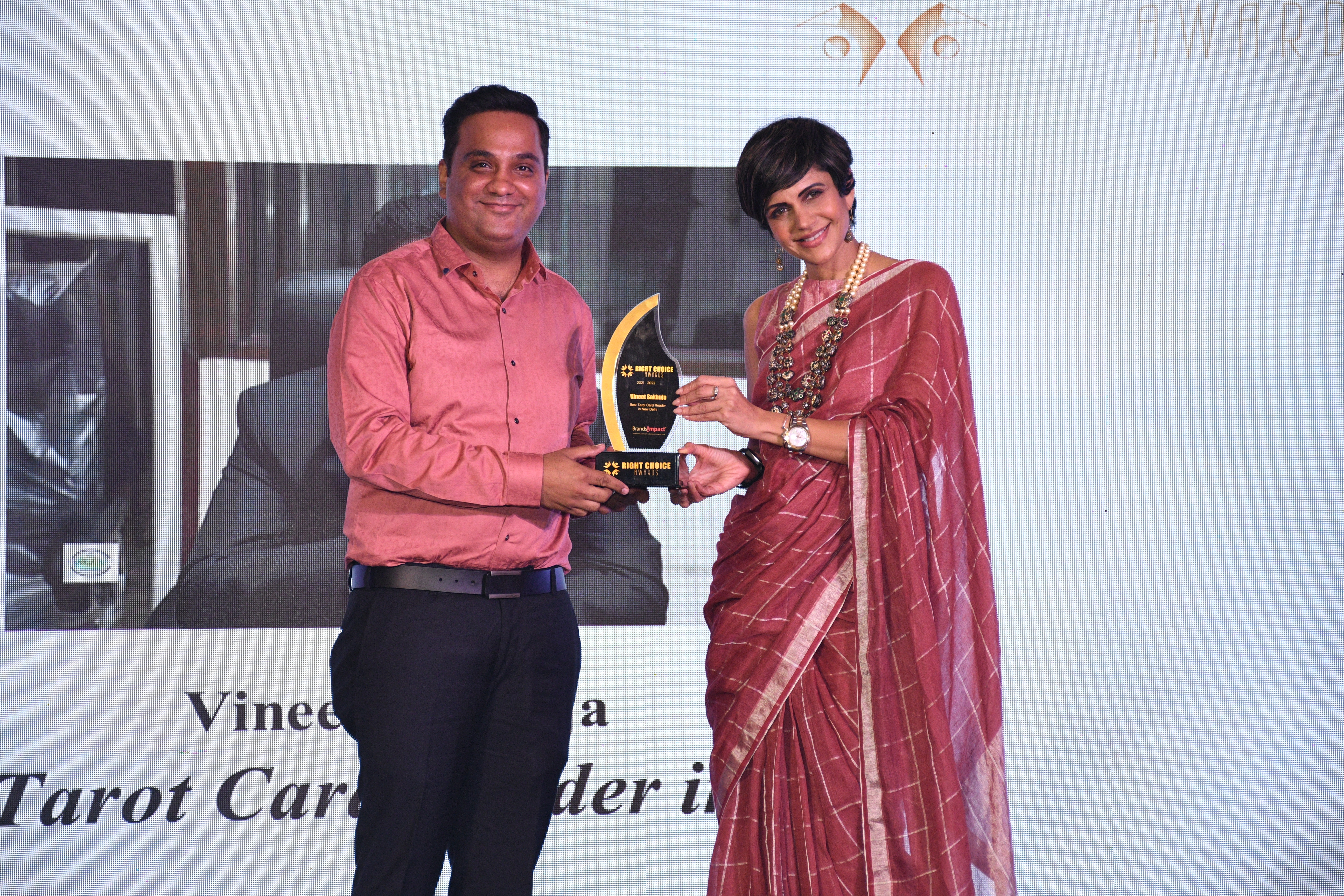 Image showing Vineet Sakhuja getting Best Tarot Card Reader in Delhi awarded by Mandira Bedi